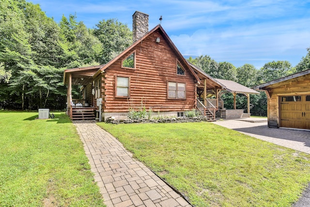 cabin with an outbuilding, a front lawn, a porch, and a garage
