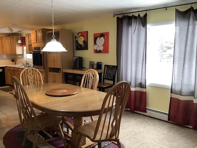 dining area featuring sink