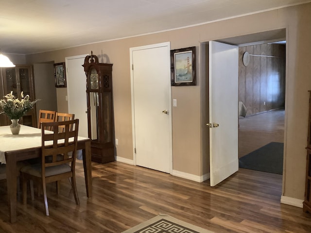 dining area featuring dark hardwood / wood-style floors