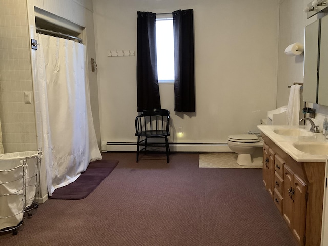 bathroom with a baseboard heating unit, toilet, vanity, and curtained shower