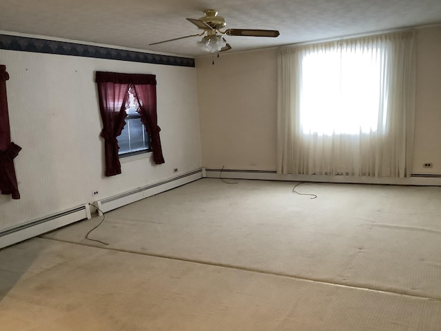 spare room with ceiling fan and carpet flooring