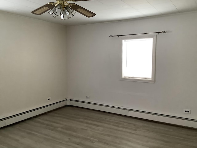 unfurnished room with dark wood-type flooring and ceiling fan