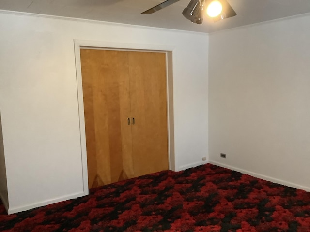 unfurnished bedroom featuring ceiling fan