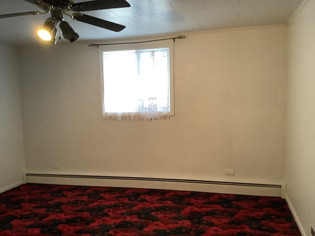 unfurnished room with ceiling fan, a baseboard radiator, and ornamental molding