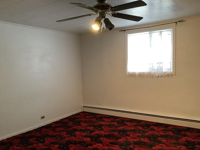 unfurnished room featuring ceiling fan, ornamental molding, and a baseboard radiator