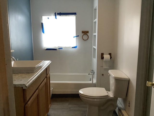 full bathroom with toilet, vanity, a wealth of natural light, and hardwood / wood-style flooring