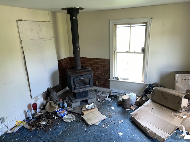 living room featuring a wood stove