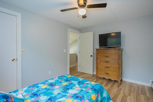 bedroom featuring ceiling fan and light wood-type flooring