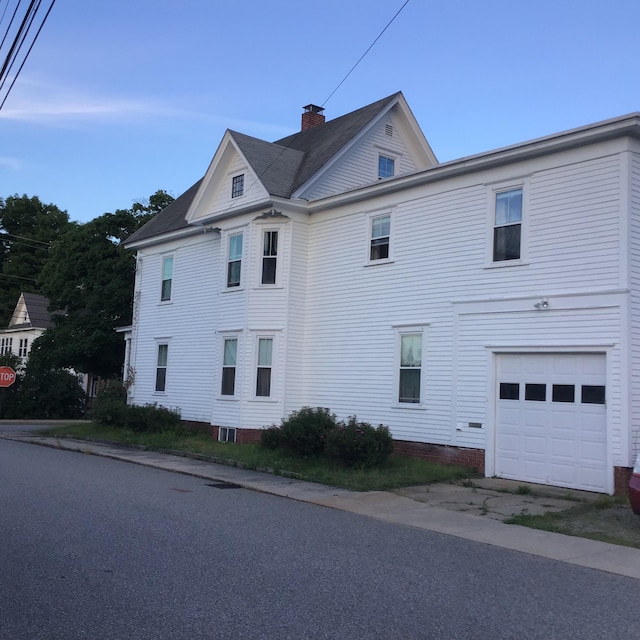 view of home's exterior featuring a garage