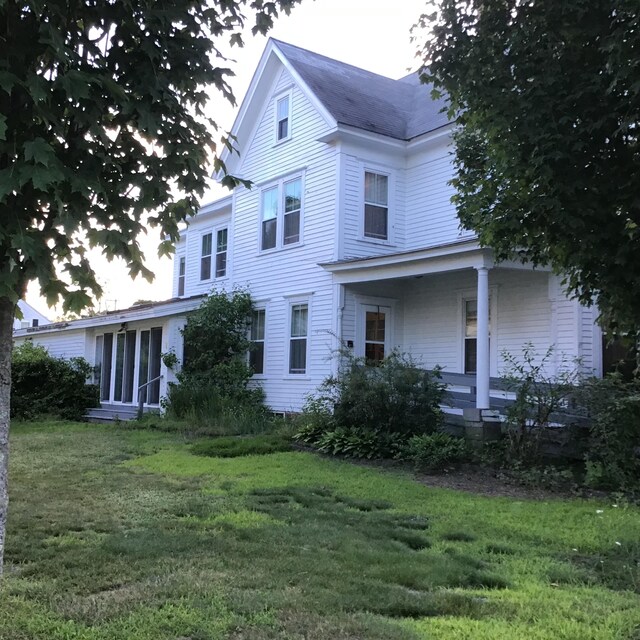 exterior space featuring a lawn