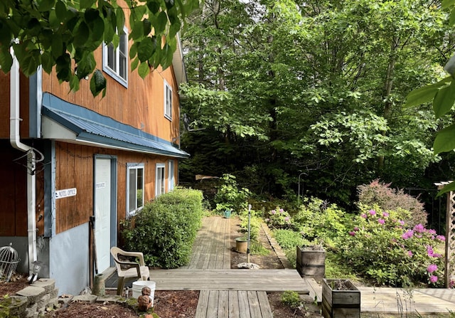 view of home's exterior with metal roof