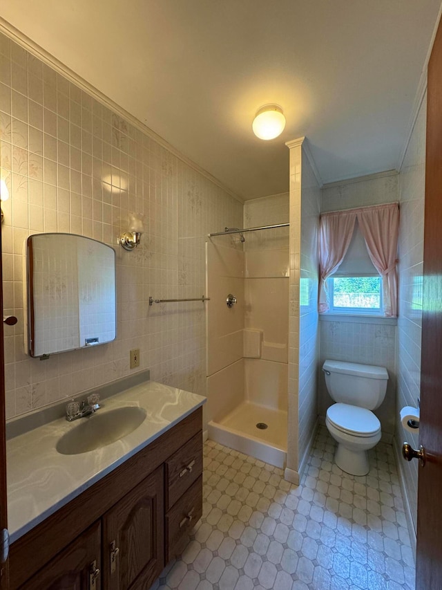 bathroom featuring tile walls, a shower, tile patterned flooring, and toilet