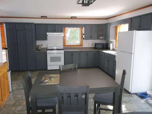 kitchen with crown molding, white appliances, and gray cabinets