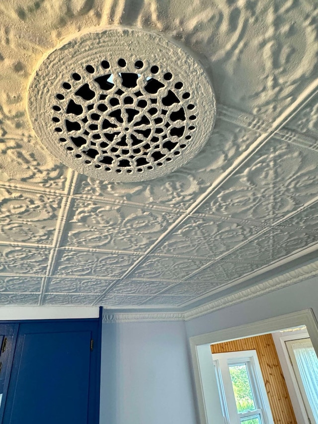 interior details featuring crown molding