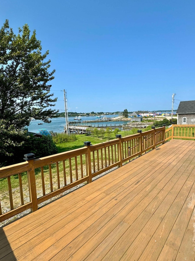 deck featuring a water view