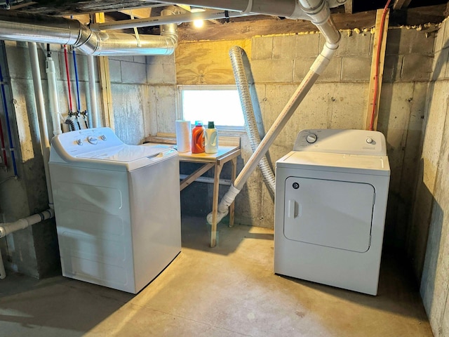 laundry area with washing machine and dryer