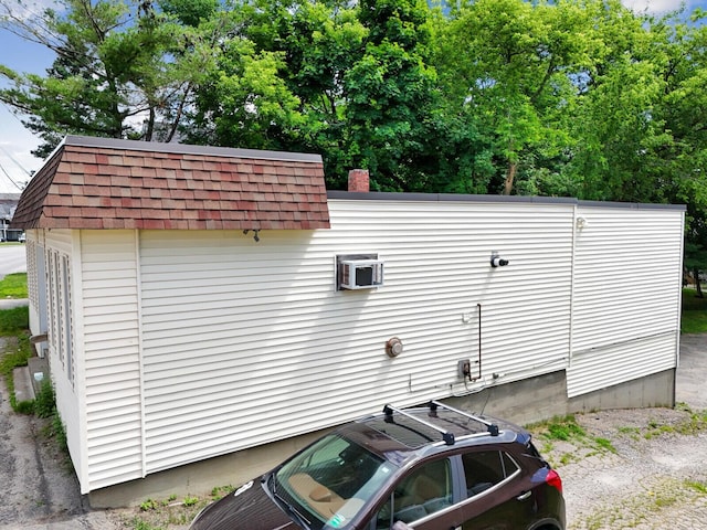 exterior space with a wall unit AC