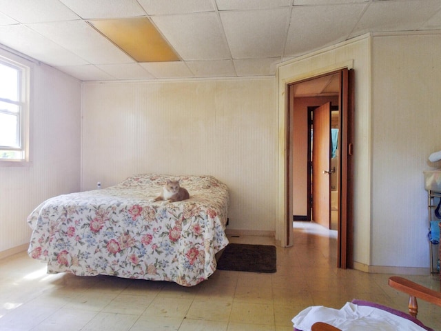 bedroom with a paneled ceiling