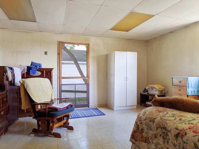 bedroom with a drop ceiling