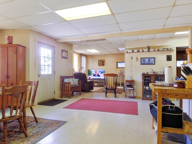 office area with a paneled ceiling