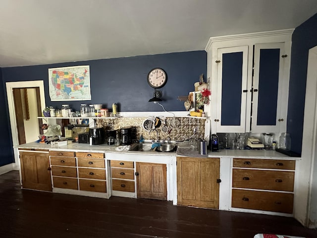 19 River Rd, Oakfield, ME 04763 - bar featuring dark wood finished floors, decorative backsplash, and a sink