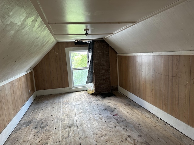 19 River Rd, Oakfield, ME 04763 - additional living space featuring lofted ceiling, hardwood / wood-style floors, and wood walls