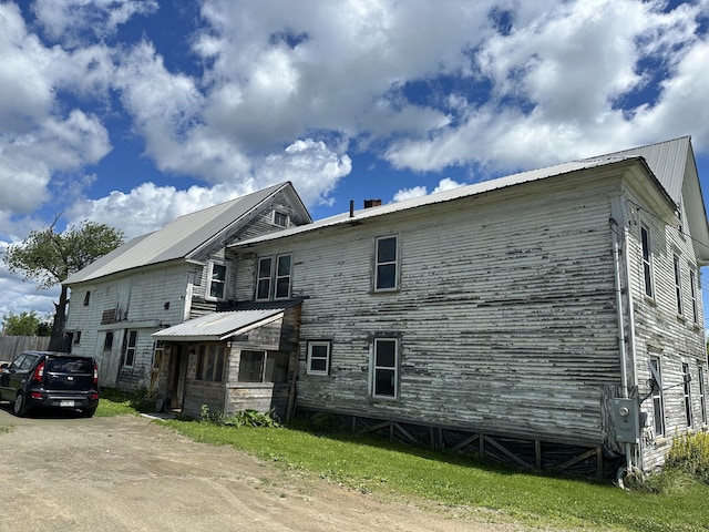 19 River Rd, Oakfield, ME 04763 - rear view of property with metal roof