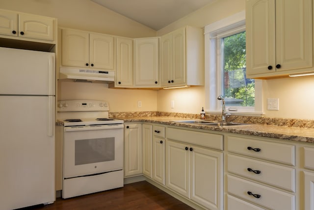 kitchen featuring lofted ceiling, sink, white cabinets, and white appliances