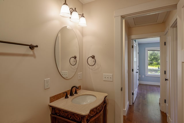 bathroom featuring vanity and wood-type flooring