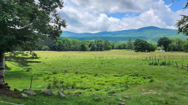 mountain view featuring a rural view