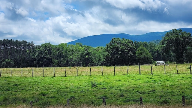 mountain view featuring a rural view