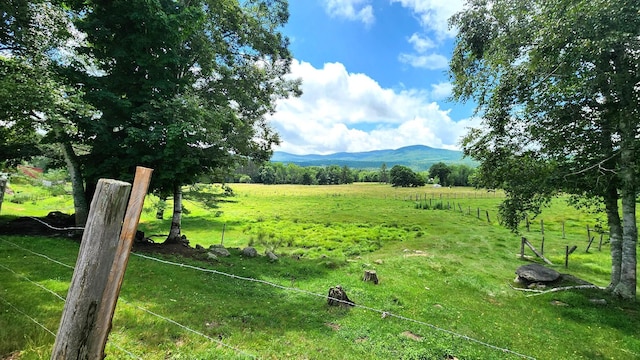 property view of mountains featuring a rural view