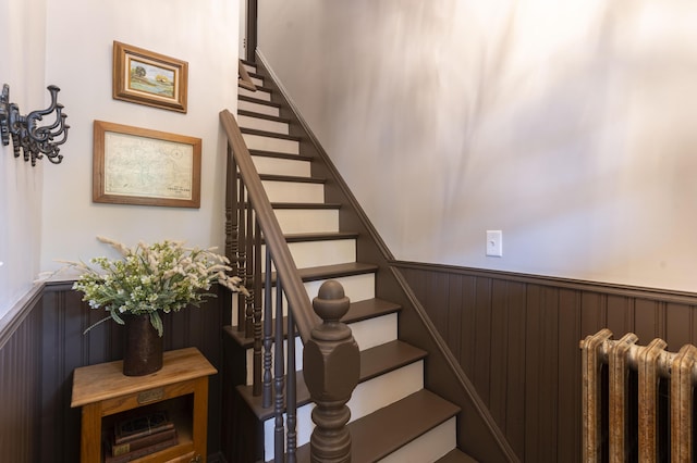 stairway featuring radiator