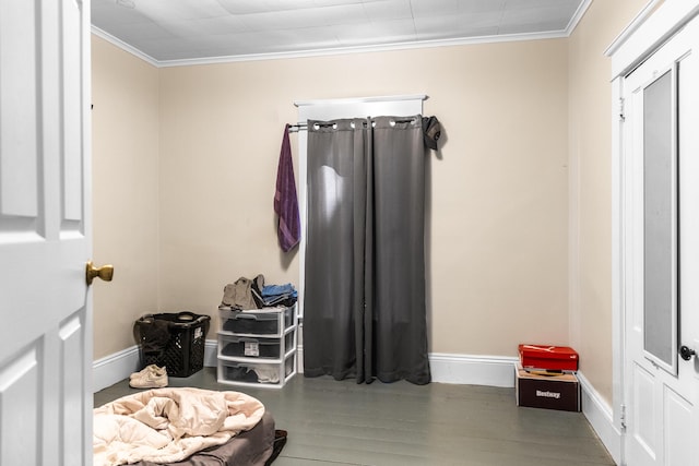 interior space featuring ornamental molding and hardwood / wood-style floors