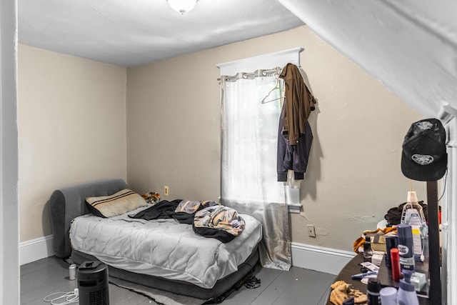 bedroom with multiple windows