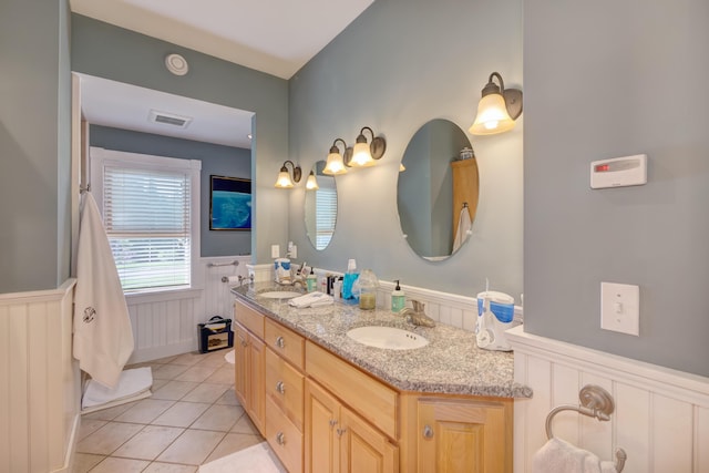 bathroom featuring vanity and tile patterned floors