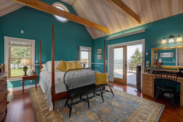 bedroom with dark hardwood / wood-style flooring, multiple windows, access to outside, and high vaulted ceiling