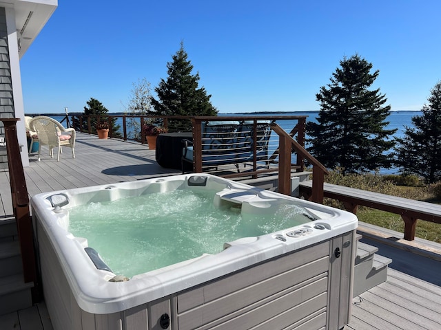 deck with a hot tub