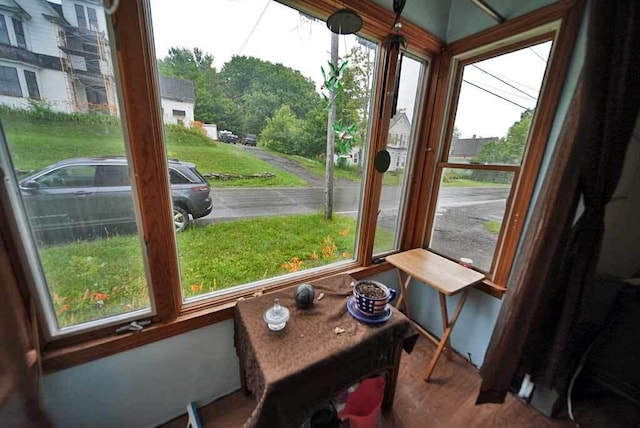 sunroom featuring a healthy amount of sunlight