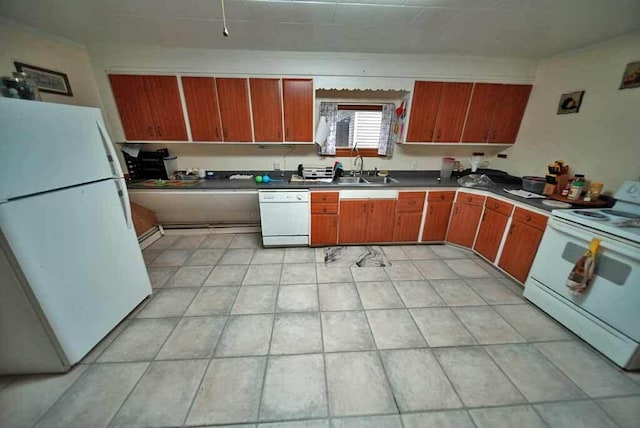 kitchen featuring sink and white appliances