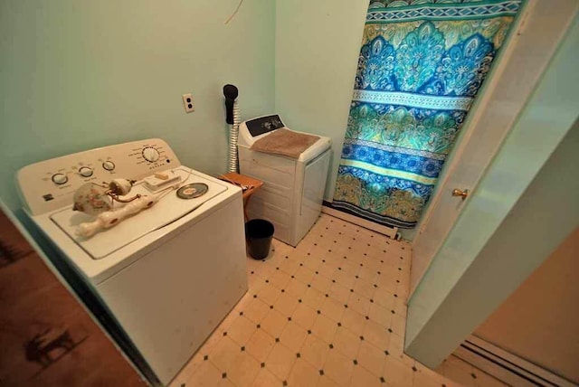 laundry area with washer and clothes dryer