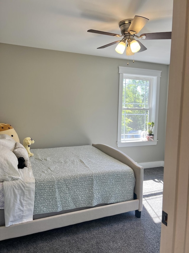 1341 Cape Rd, Limington, ME 04049 - carpeted bedroom featuring baseboards and ceiling fan