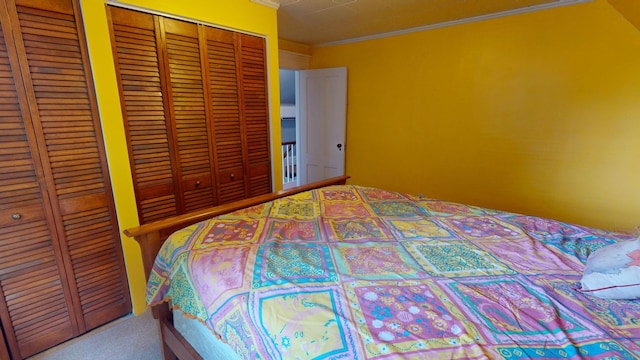 carpeted bedroom featuring crown molding