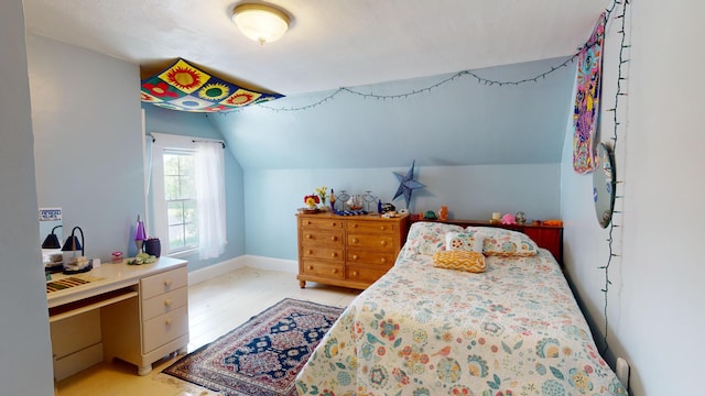 bedroom with vaulted ceiling