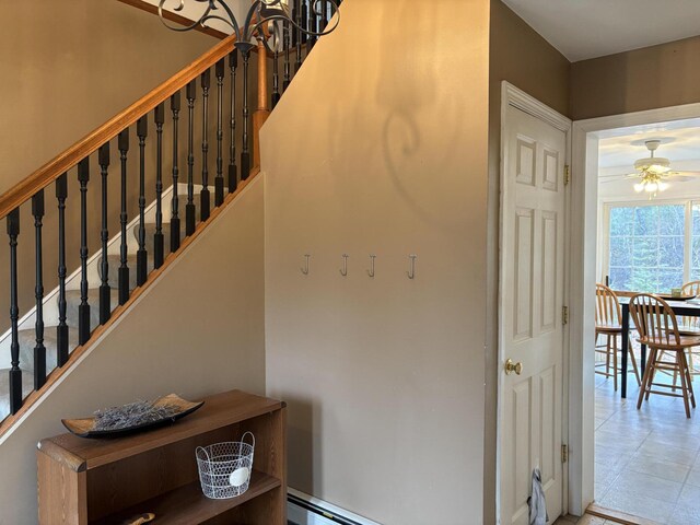 186 Line Rd, Buxton, ME 04093 - stairway featuring ceiling fan and tile patterned flooring