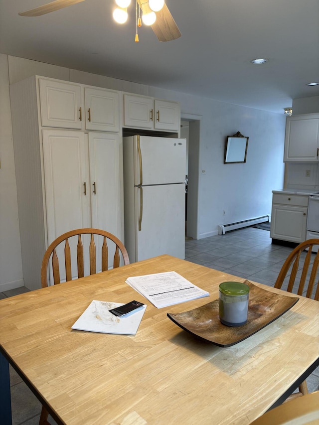 186 Line Rd, Buxton, ME 04093 - dining area with a ceiling fan, baseboard heating, baseboards, and recessed lighting