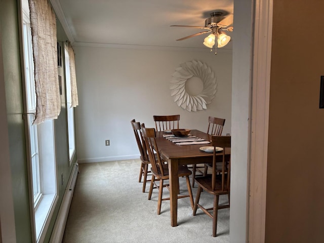 186 Line Rd, Buxton, ME 04093 - dining area featuring carpet, a ceiling fan, ornamental molding, baseboards, and baseboard heating