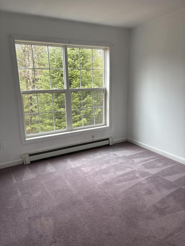 186 Line Rd, Buxton, ME 04093 - carpeted spare room featuring baseboard heating and baseboards