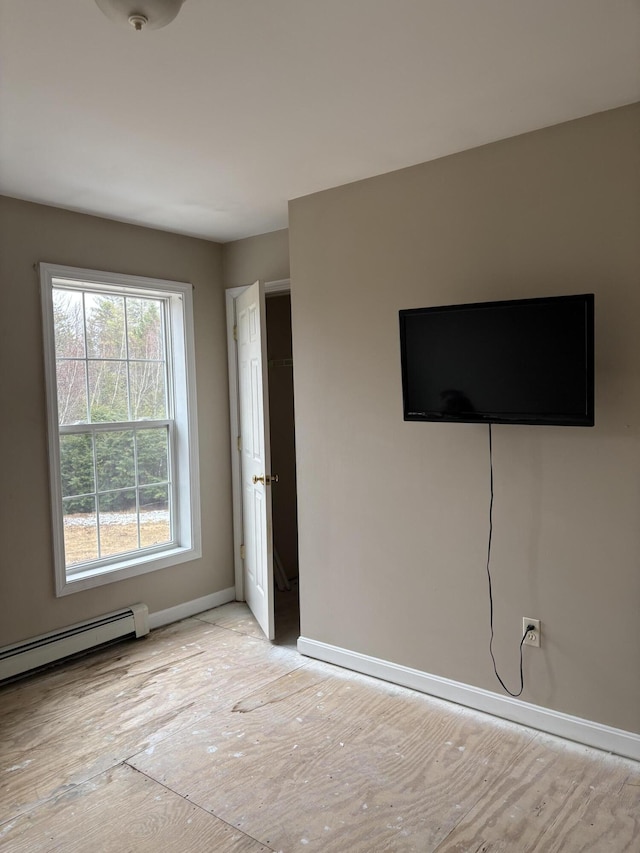 186 Line Rd, Buxton, ME 04093 - unfurnished bedroom featuring baseboards and a baseboard heating unit
