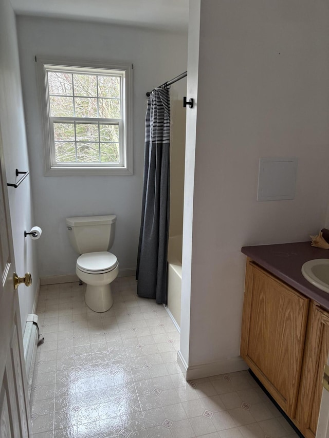 186 Line Rd, Buxton, ME 04093 - bathroom with toilet, vanity, baseboards, and shower / bath combo
